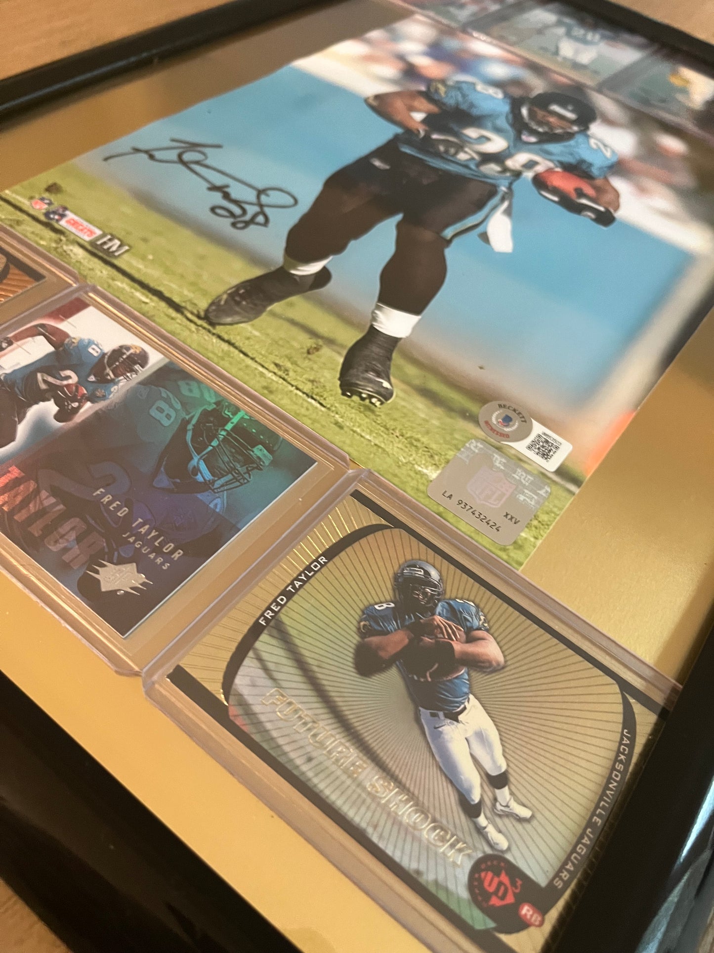 Autographed Fred Taylor Framed Sports Portrait with Trading cards